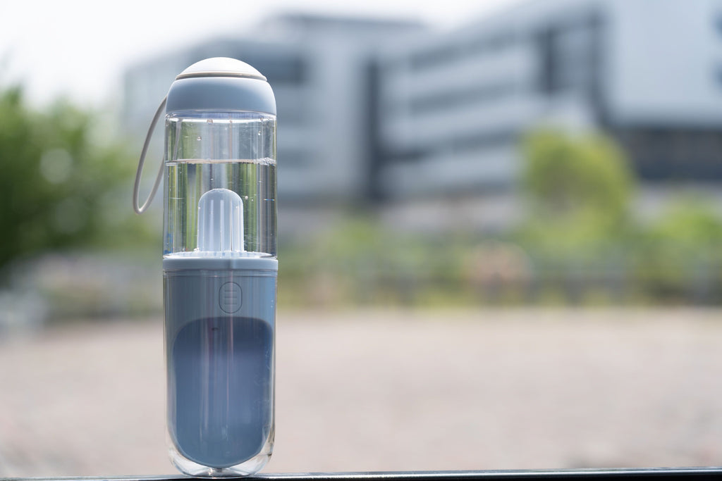 Pet Life ® Handheld Travel Filtered Water Feeder